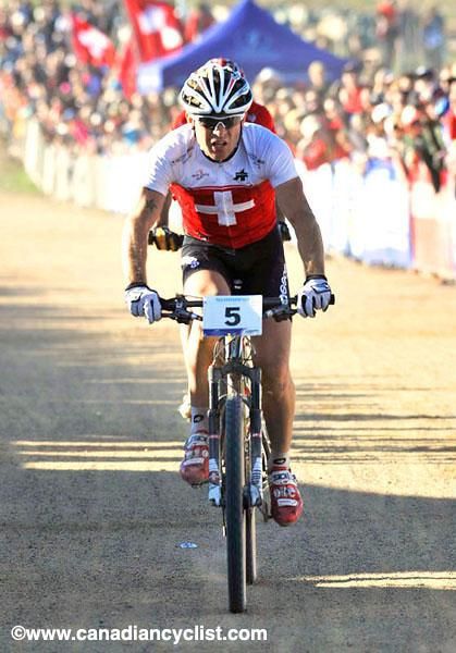Florian Vogel (Switzerland) cruises in and takes bronze.