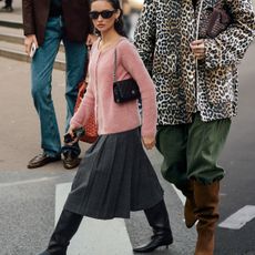 Collage of street fashion outfits featuring black kitten heel boots, suede knee-high boots, and loafers. 