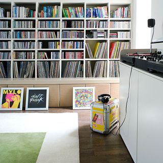 party living room with dj decks and vinyl records