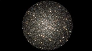 Hundreds of thousands of stars move about in the globular cluster M13.