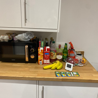 kitchen side covered with clutter