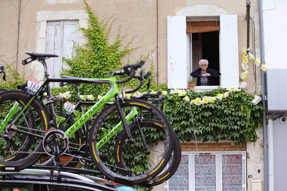 A fan has a birds-eye view of stage 11 at the Tour de France