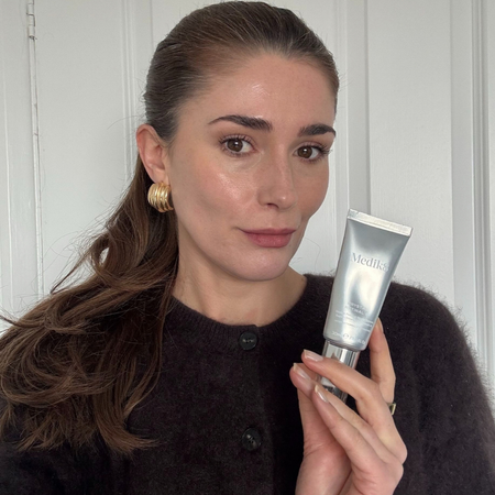 Eleanor holding a Medik8 serum
