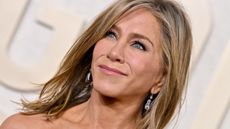 jennifer aniston on a cream background