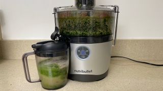 making a green juice in the Nutribullet juicer pro