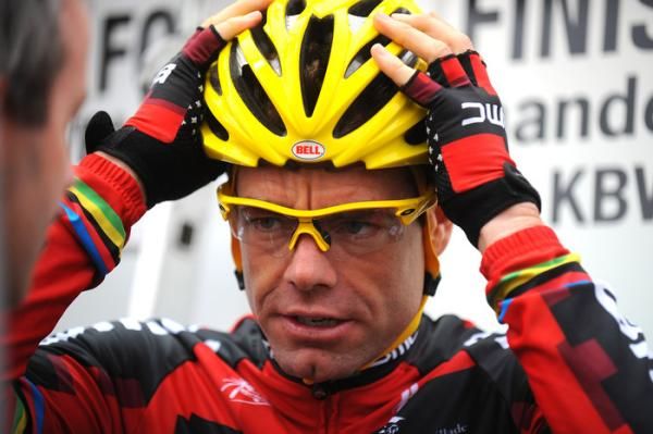 Evans has a bright yellow helmet to match his maillot jaune