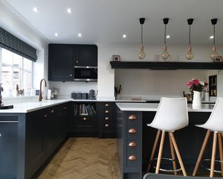 A classic shaker-style kitchen with quartz countertops