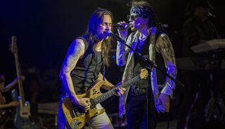 Nuno Bettencourt (left) and Gary Cherone perform onstage with Extreme at the Celebrity Theatre in Phoenix, Arizona on December 14, 2019