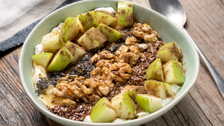 Flaxseed with nuts and apple on Greek yoghurt