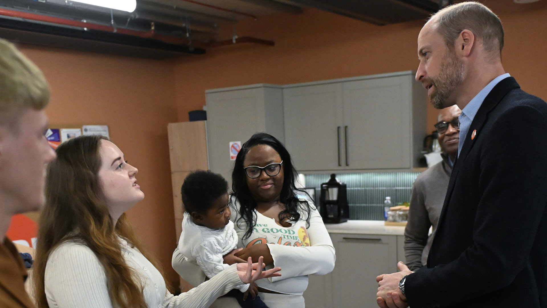 Prince William talking to people at Centrepoint