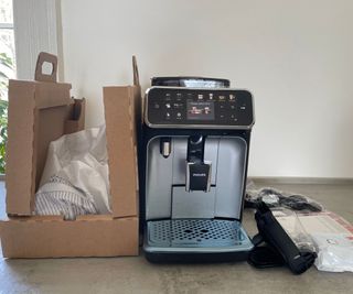 Philips 5400 Series LatteGo on the countertop with packaging around it