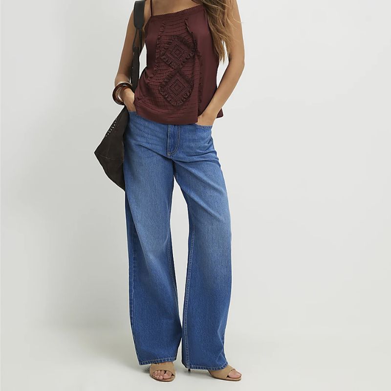 Blue High Waisted Relaxed Straight Leg Jeans on model