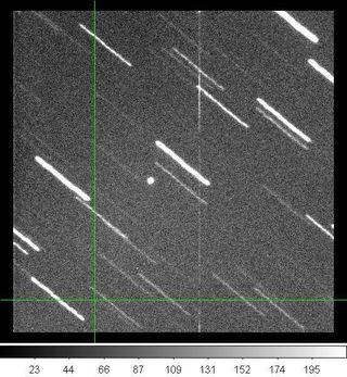 Tiny Asteroid That Buzzed Earth Is a Fast-Spinning Rock