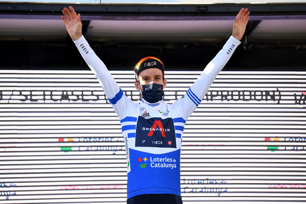 VALLTER 2000 SETCASES VALL CAMPRODON SPAIN MARCH 24 Podium Adam Yates of United Kingdom and Team INEOS Grenadiers Blue Points Jersey Celebration during the 100th Volta Ciclista a Catalunya 2021 Stage 3 a 2031km stage from Canal Olmpic de Catalunya to Vallter 2000 Setcases Vall Camprodon 2125m Mask Covid safety measures Trophy VoltaCatalunya100 on March 24 2021 in Vallter 2000 Setcases Vall Camprodon Spain Photo by David RamosGetty Images