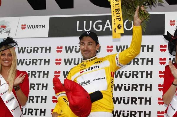 Yellow jersey Fabian Cancellara (Leopard Trek) waves to the crowd