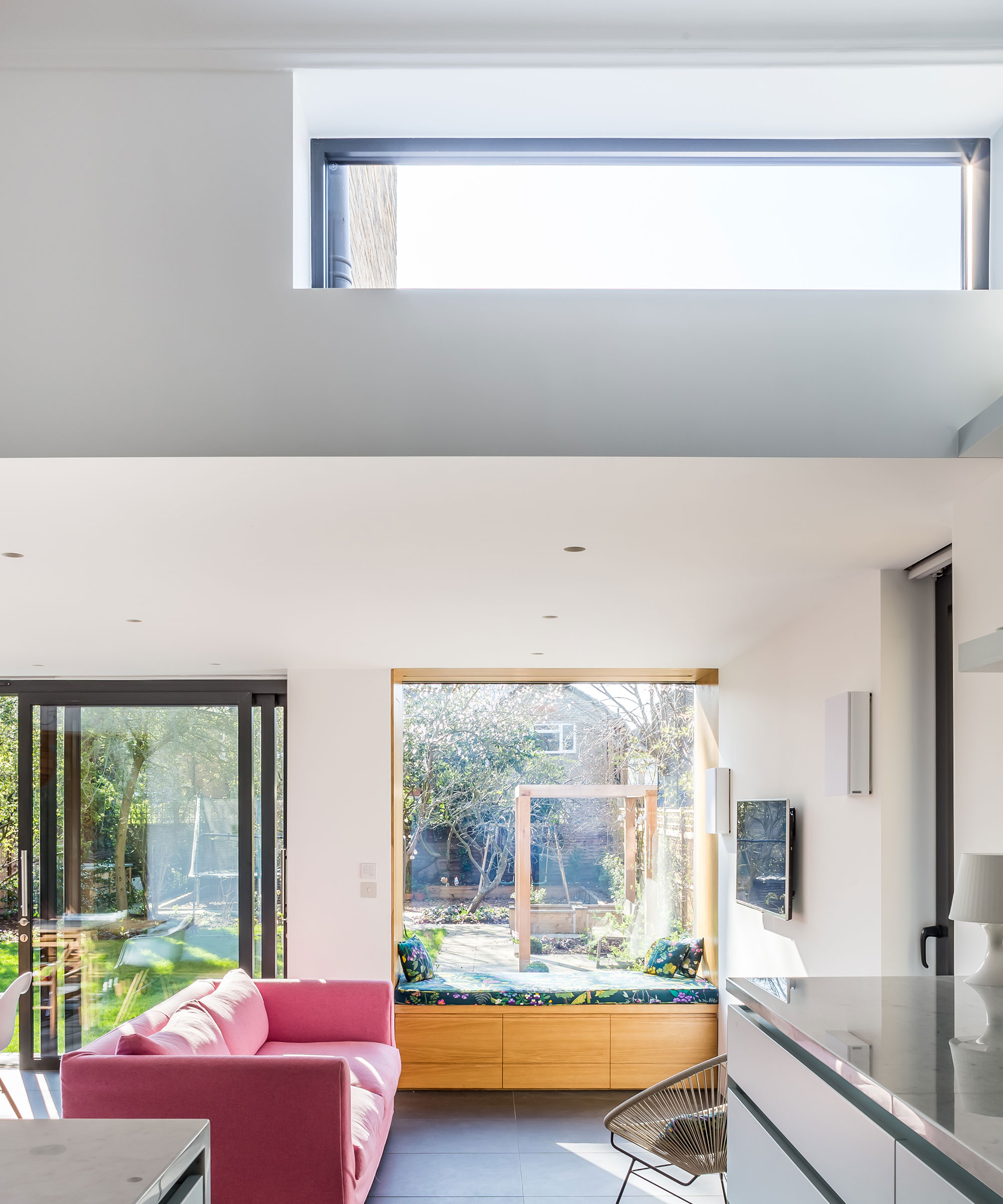modern living room with lots of glazing and a clerestory window
