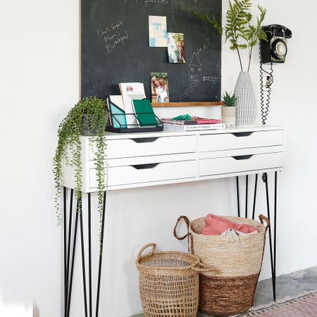 Hallway storage with chalkboard