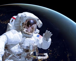 astronaut waving to camera in outer space