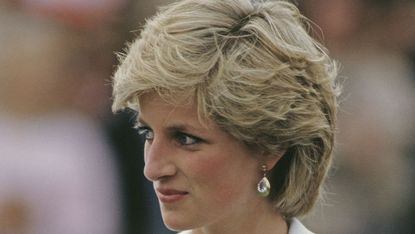 diana, princess of wales 1961 1997 visits a school for the deaf and dumb in yaoundé, cameroon, march 1990 she is wearing a pink and yellow suit by catherine walker and a philip somerville hat photo by jayne fincherprincess diana archivegetty images