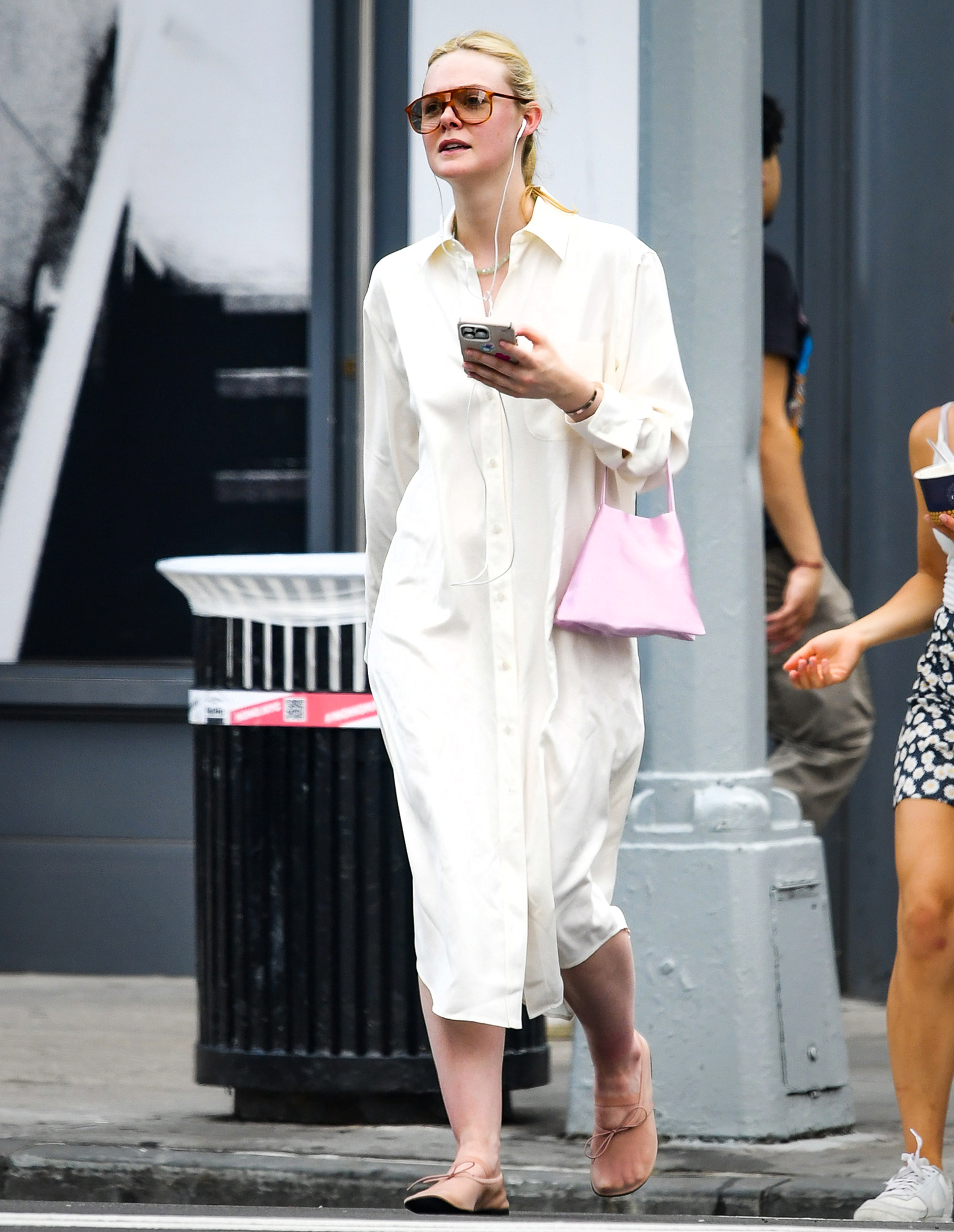 Elle Fanning styled the Mary Janes trend with a mesh pair on June 12