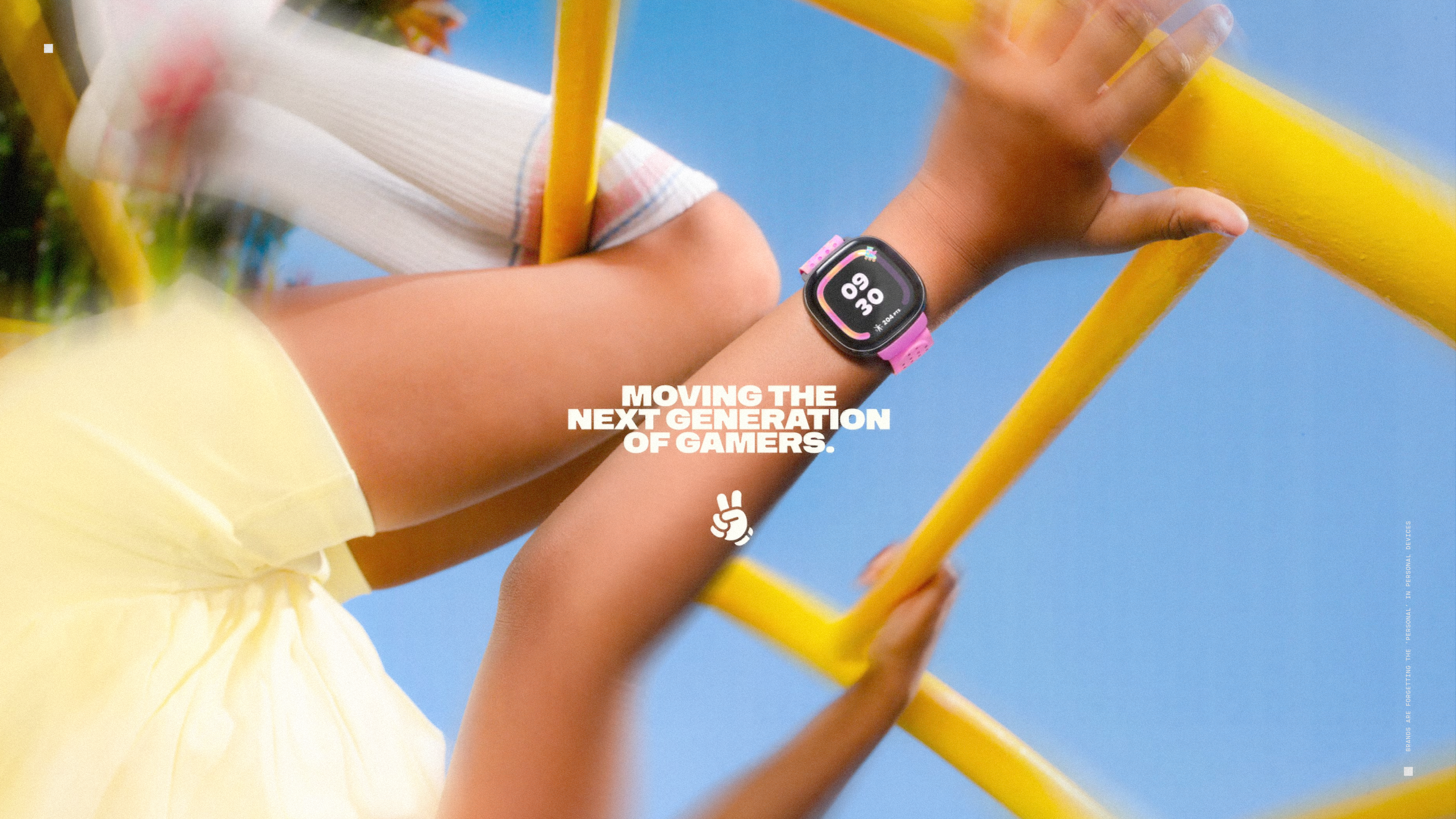 moving the next generation of gamers - child on climbing frame with smartwatch on