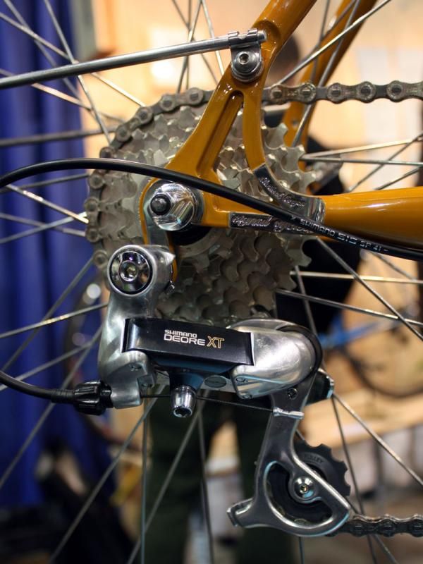 Not only does the rear end of this Signal Cycles frame sport a new old stock Deore XT rear derailleur, it's even a short-cage variant.