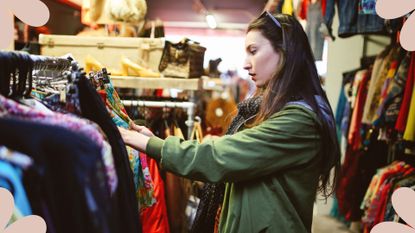 How to shop sustainably: a woman browses clothes in a thrift store.