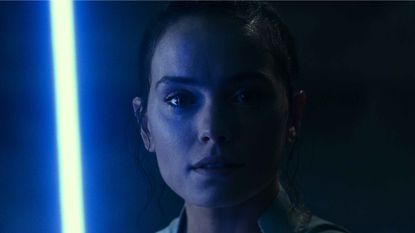 Best Star Wars movies: “Star Wars: The Rise of Skywalker” still image of Rey, blue background