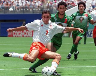 Dutch winger Marc Overmars lines up a shot against Morocco in the 1995 World Cup.