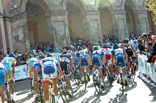 The peloton heads out from Bologna