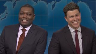 Michael Che and Colin Jost side by side during Weekend Update on SNL