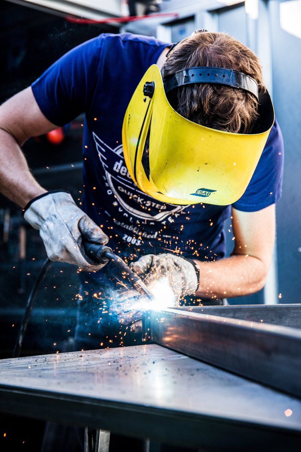 Bert Van Lerberghe gets his welding gear out to build a table