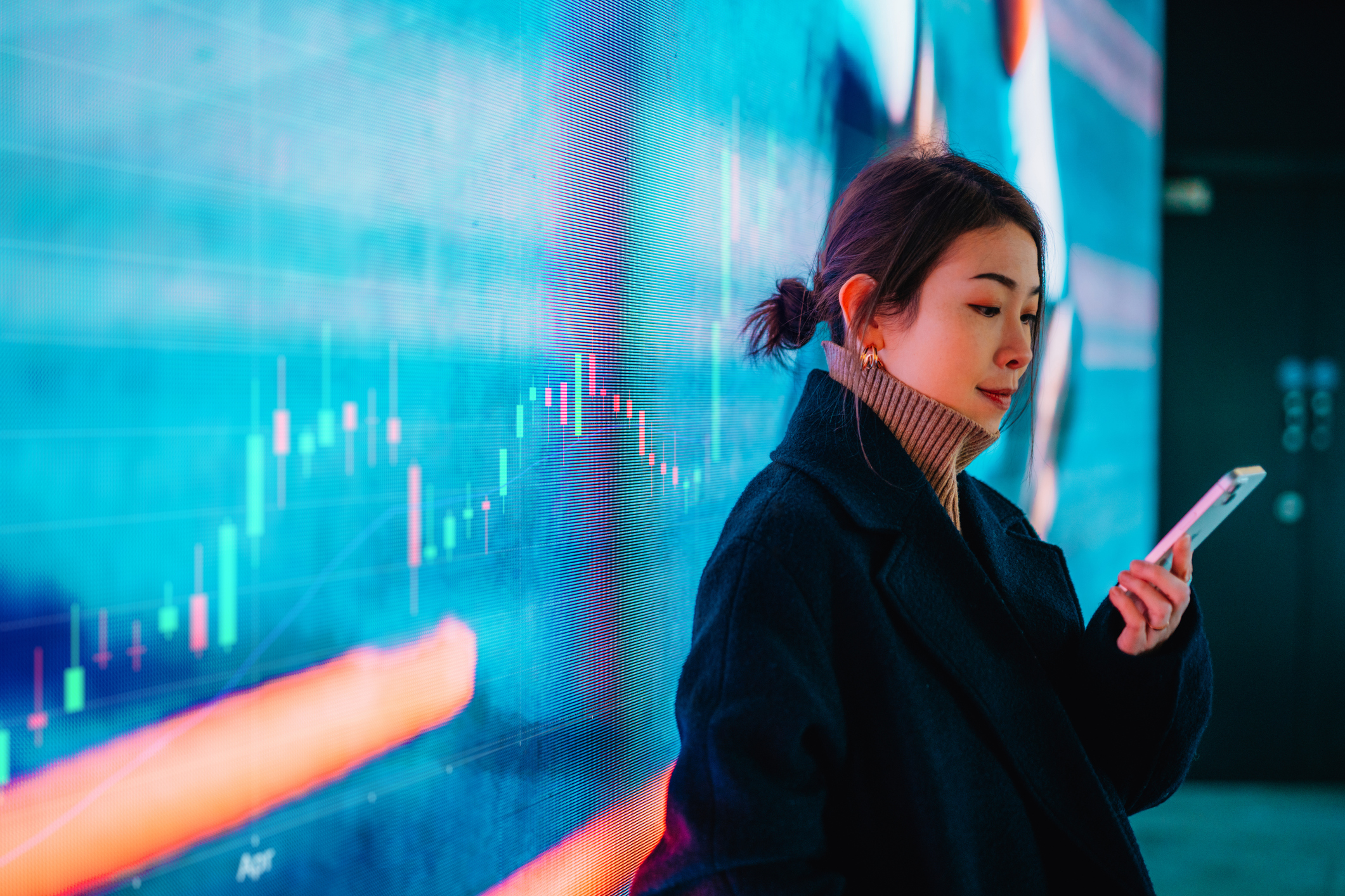 Woman looking at smartphone