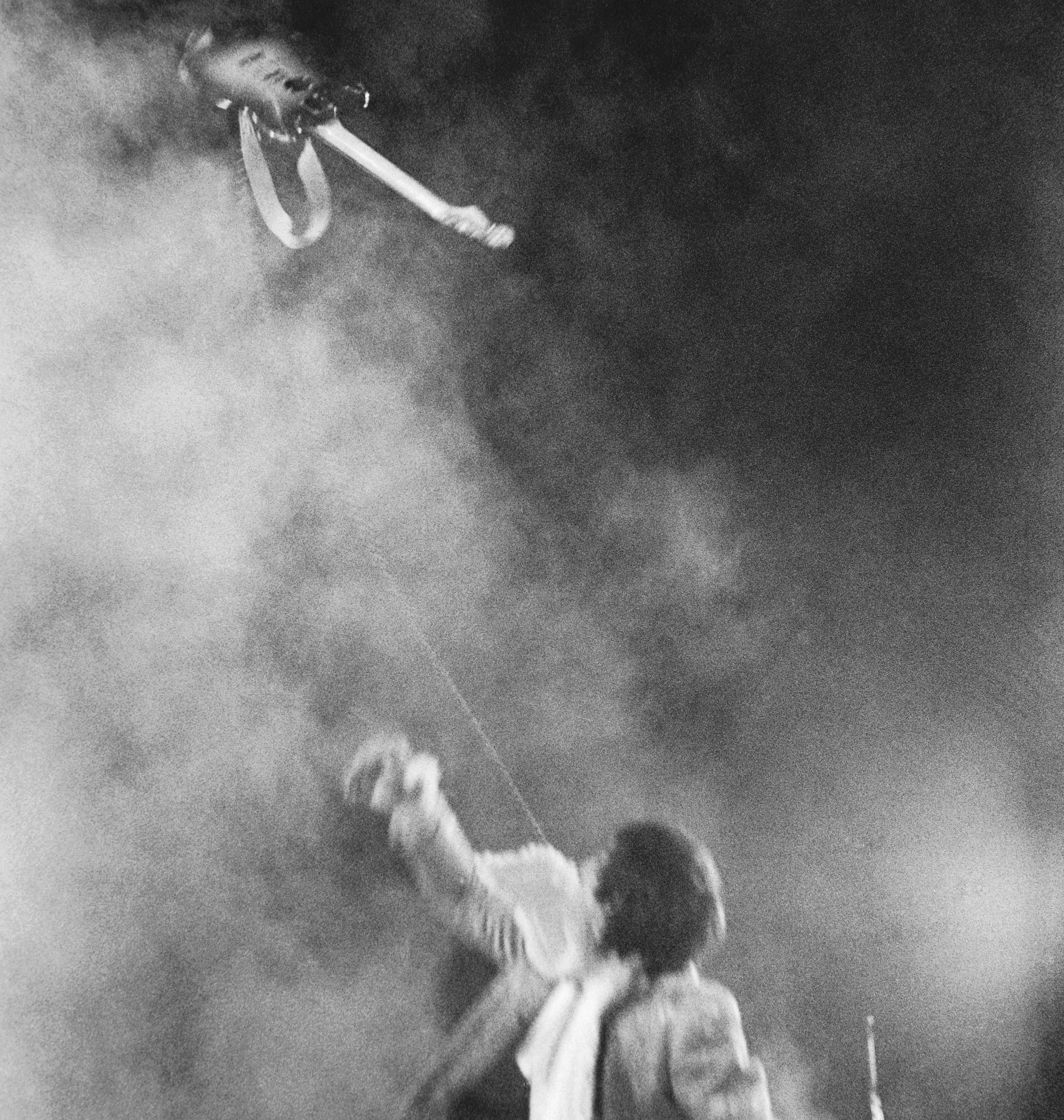 Guitarist Pete Townshend of the rock and roll band &#039;The Who&#039; tosses his electric guitar in mid-air as he performs onstage at Atwood Stadium on August 23, 1967 in Flint Michigan. This is the same night that Keith had his 21st (actually his 20th) birthday party and was arrested and banned for life from the Holiday Inn chain of hotels
