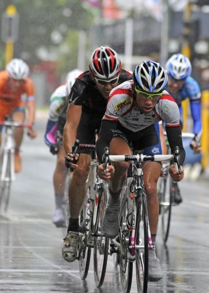 The few remaining riders are getting a good soaking