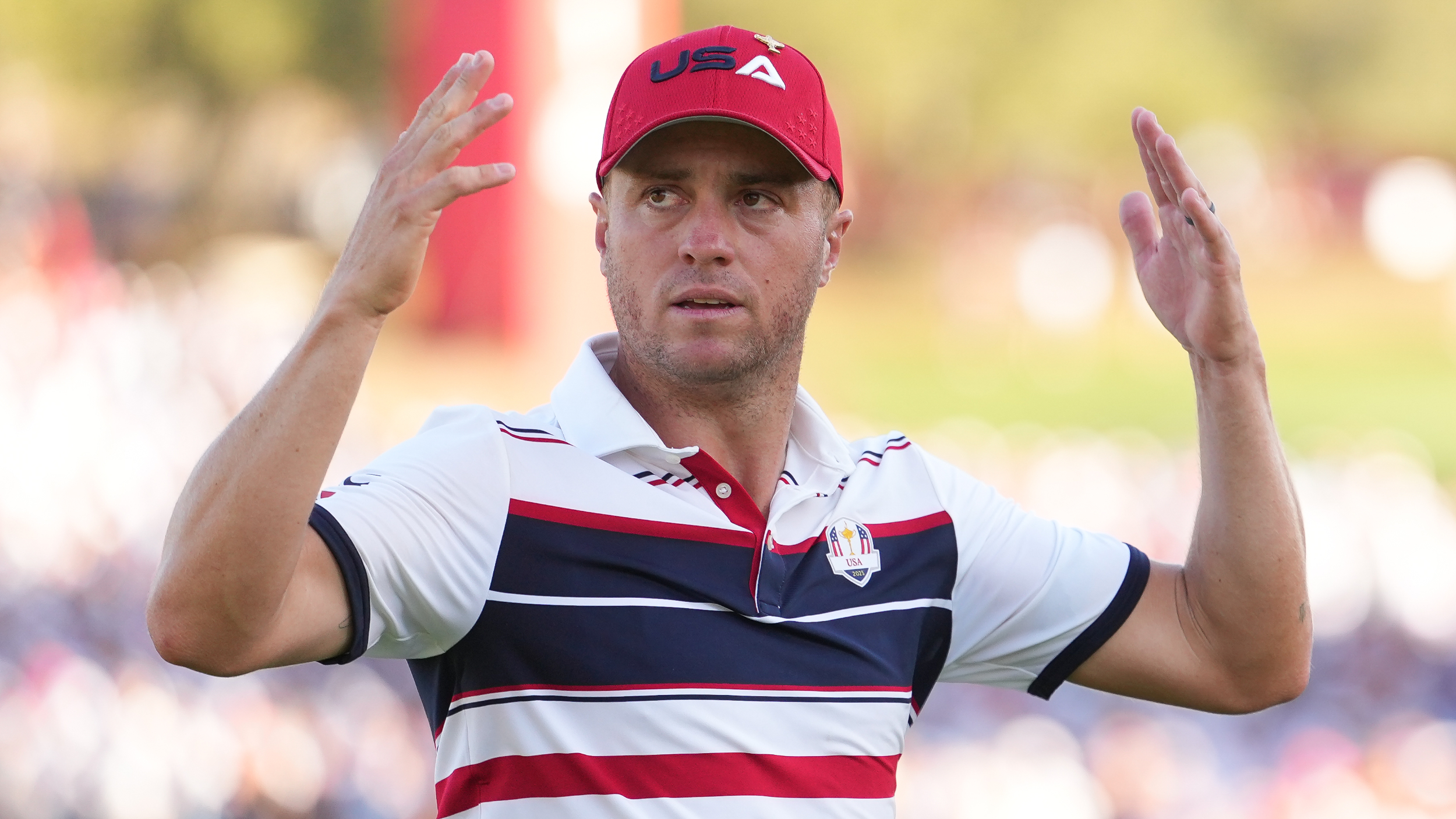 Justin Thomas gees up the crowd at the Ryder Cup
