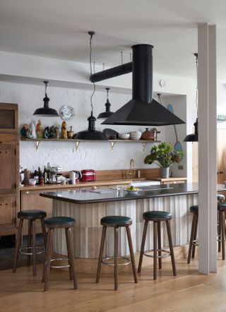 Wooden kitchen with textured tiled island
