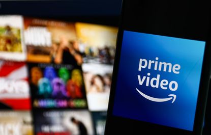 Amazon Prime Video logo displayed on a phone screen and Amazon Prime Video website displayed on a screen in the background are seen in this illustration photo taken in Krakow, Poland on July 26, 2022.