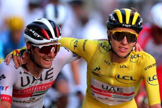 Jan Polanc celebrates Tadej Pogacar's 2020 Tour de France win with his countryman