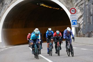 The pack rides during the 6th stage of the Paris-Nice cycling race, 198,5 km between Sisteron and La Colle-sur-Loup, on March 8, 2024. (Photo by Thomas SAMSON / AFP)