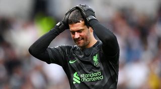 Liverpool goalkeeper Alisson Becker reacts after a Luis Diaz effort is ruled out by VAR against Tottenham in the Premier League in September 2023.