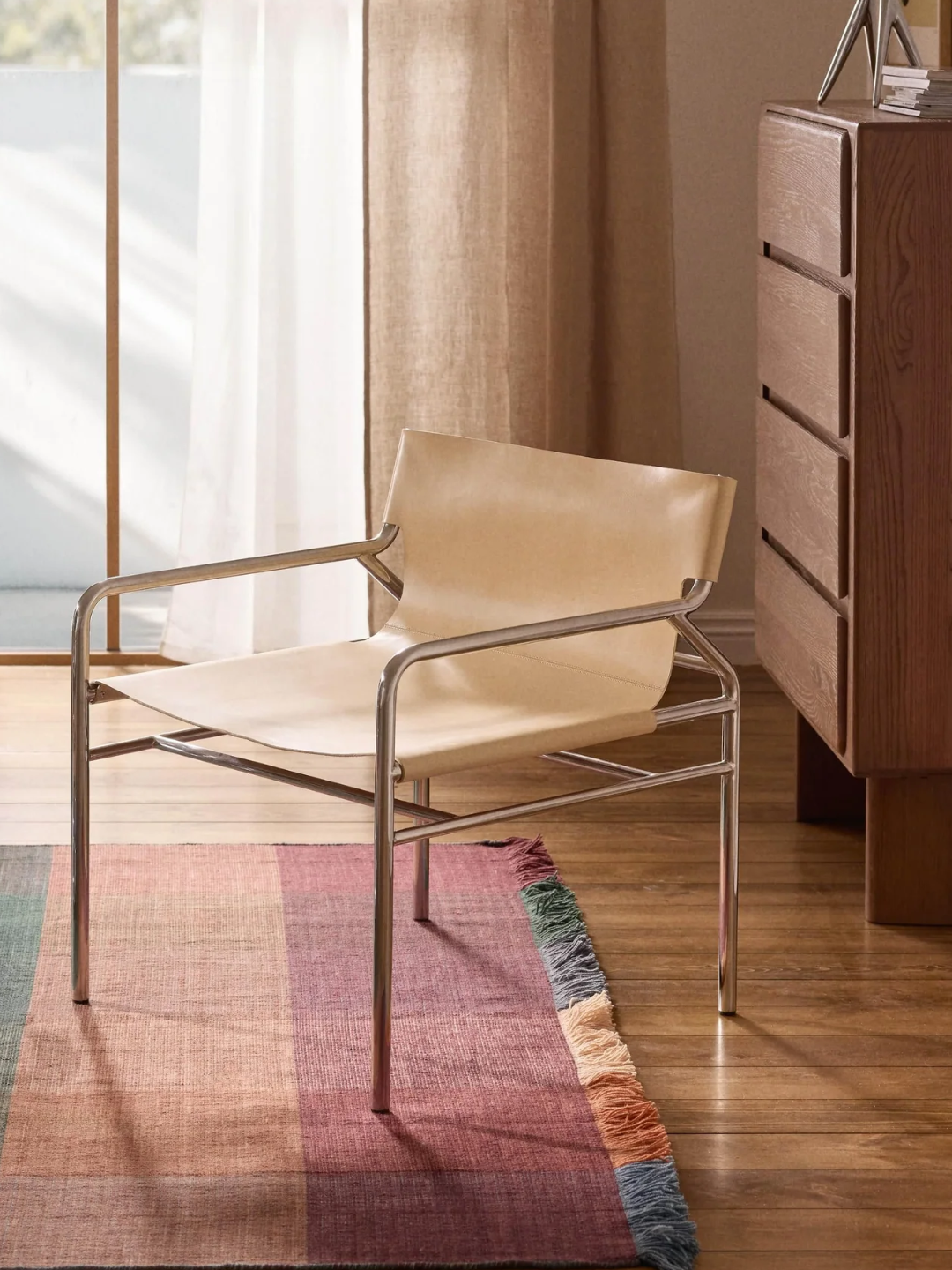 A white leather armchair from Westwing