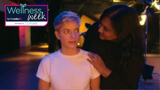 Mae Martin looks sideways at someone in the Netflix show Feel Good 