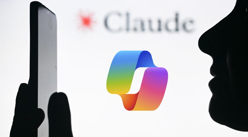 EDMONTON, CANADA - APRIL 28:An image of a woman holding a cell phone in front of the Claude AI logo displayed on a computer screen, on April 29, 2024, in Edmonton, Canada. (Photo by Artur Widak/NurPhoto via Getty Images)