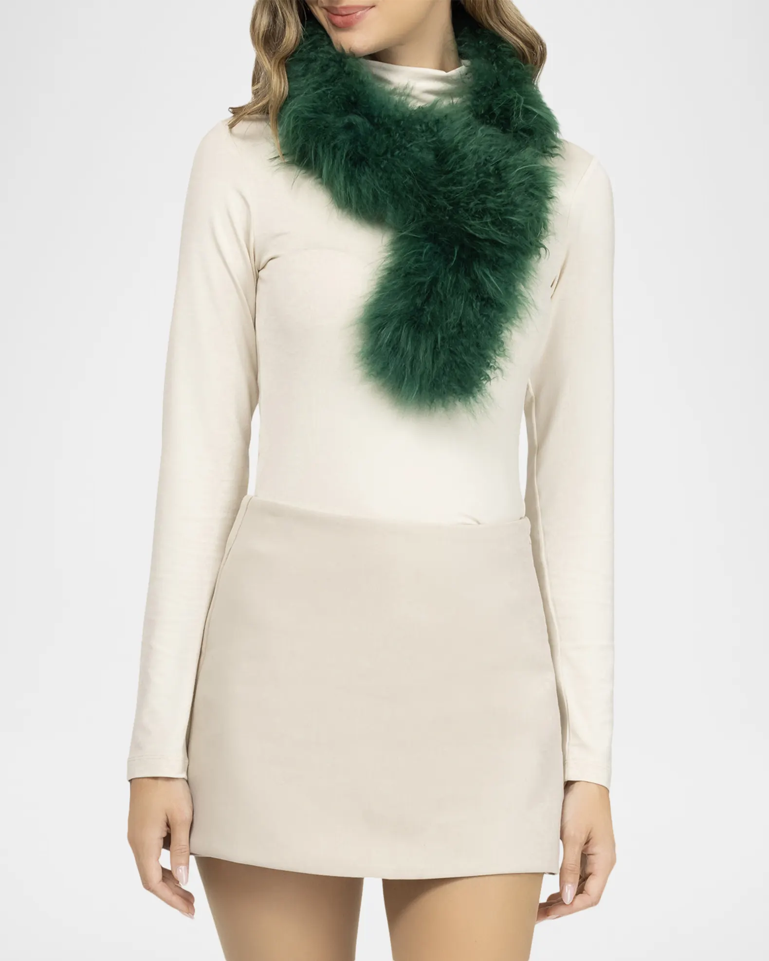 A model wearing a green fur scurf