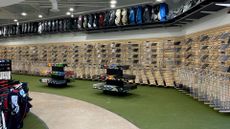 The interior of a 2nd Swing store lined with Golf clubs