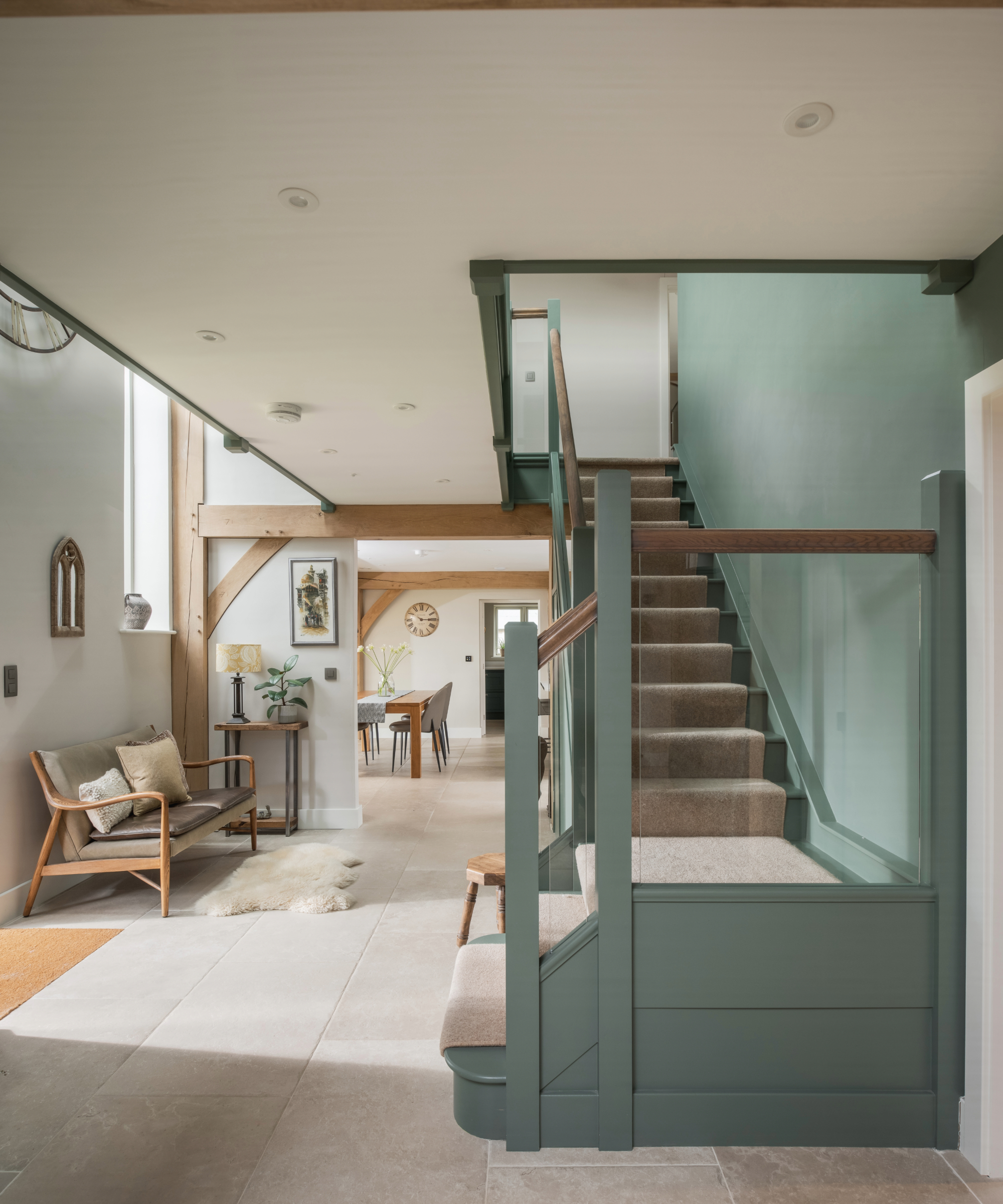 Downstairs hallway with staircase to the right