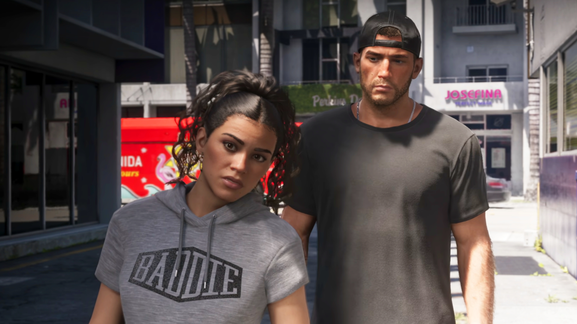 A screenshot of GTA 6's Extended Look on Netflix. Main character's Jason and Lucia stand in an alleyway looking toward the camera as another character walks away.