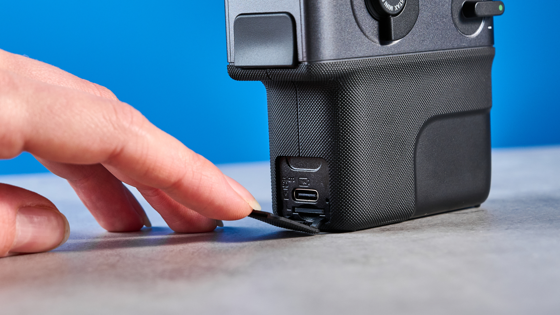 A Fujifilm Instax mini Evo Cinema hybrid instant camera