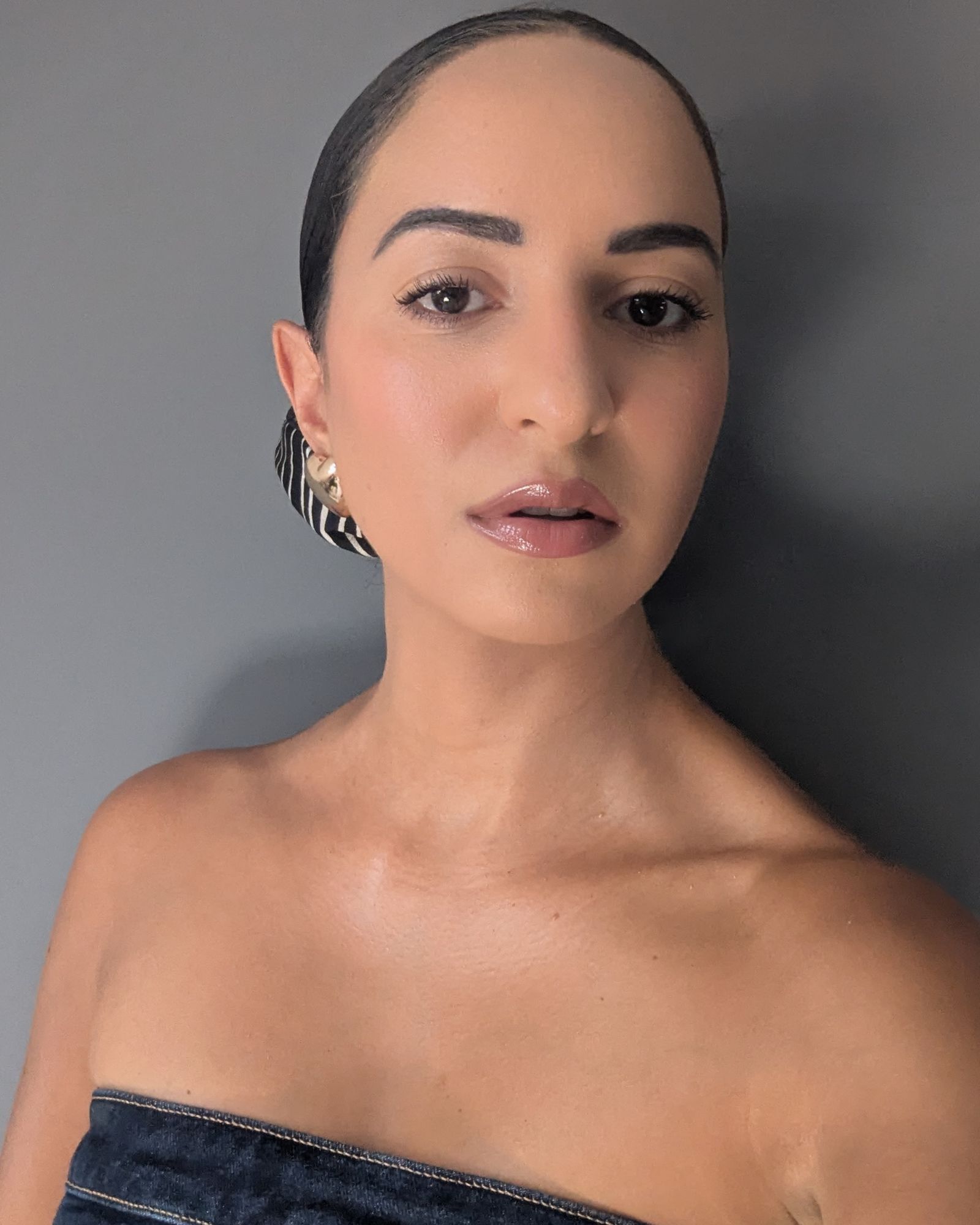 Jazzria Harris wearing Charlotte Tilbury Airbrush Flawless Foundation, one of the best blurring foundations